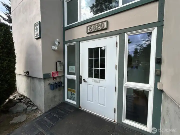 Key box located on railing of side entrance of #A building, nearest entrance to the unit.
