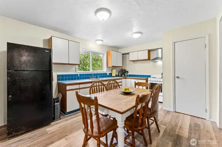 LVP or Laminate throughout