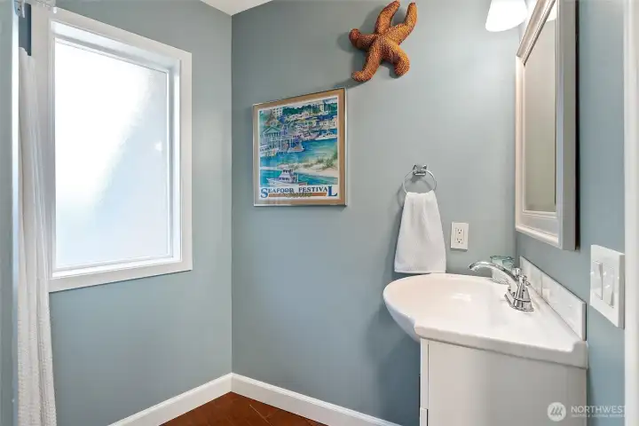 Bathroom off gargage with shower