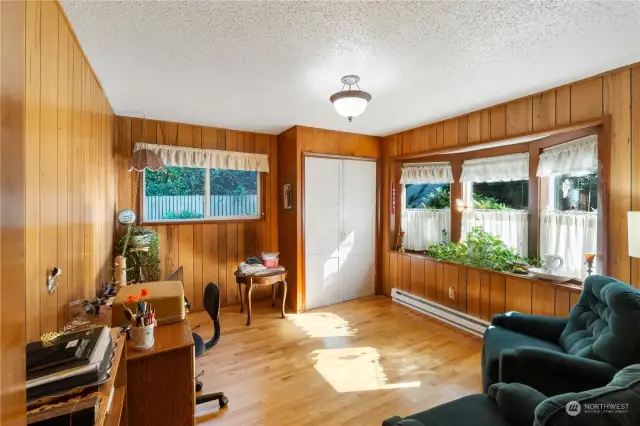 Front main floor bedroom/office/den. Lovely light.