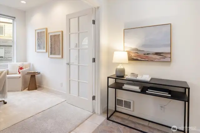 French doors open to the second bedroom (no closet) or office just off the entry area - a sunny room to enjoy.