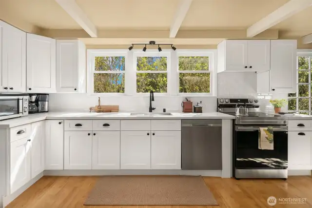 Kitchen was upgraded in 2024, new countertops, cabinets, backsplash, fixtures and appliances