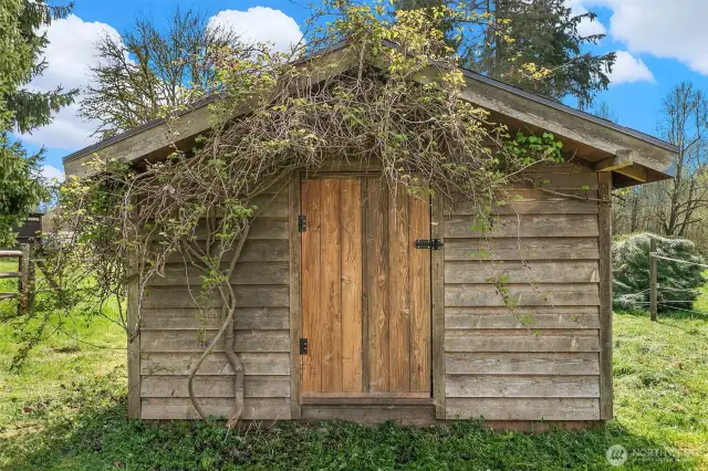 Well House with greenhouse located behind it. Located off of backside of home.