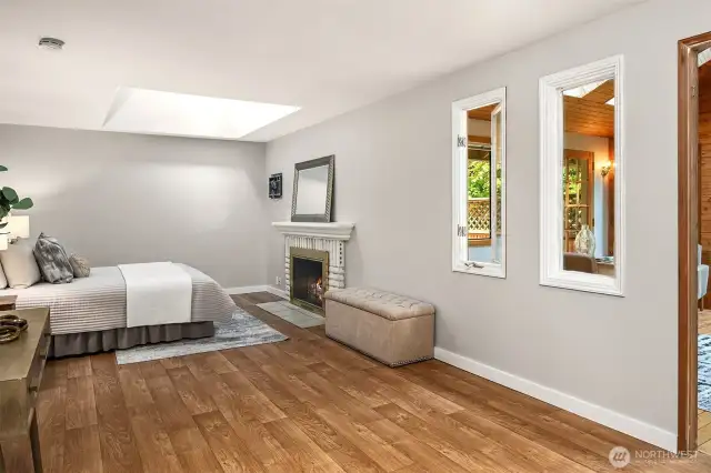 Owner Suite with fireplace and wall (remove??) to sunroom!