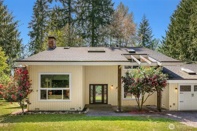 Welcome to this gorgeous NW Comtemporary home