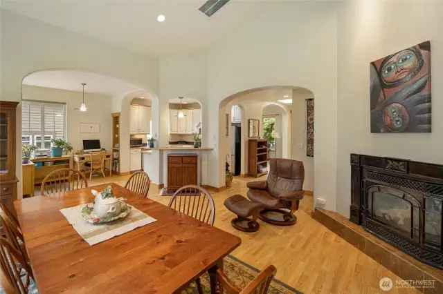 Great room with high ceilings, kitchen and entry hall
