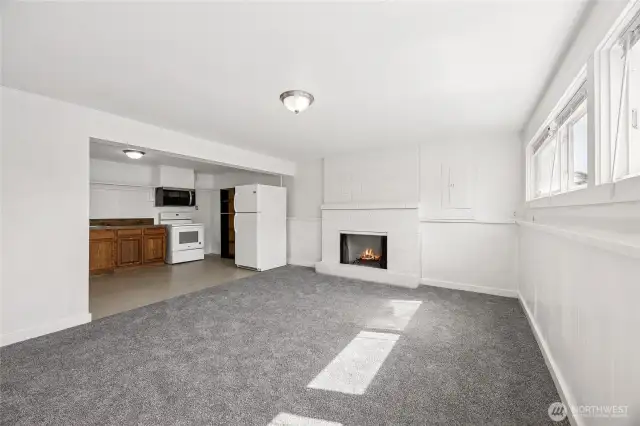 Downstairs family room with fireplace