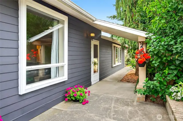 Mature landscaping at entry
