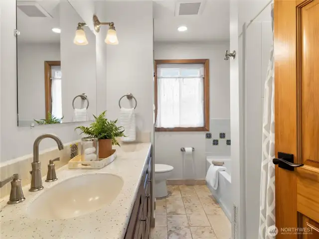 Large main bath with separate tub and shower