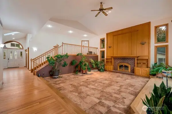 Landing outside of Primary bedroom overlooking the great room and views of islands and sound.