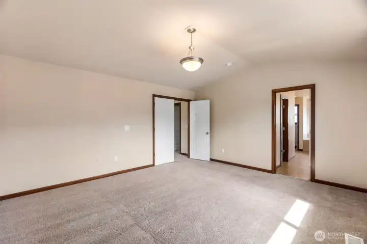 Primary bedroom is very spacious and features an ensuite five piece bath