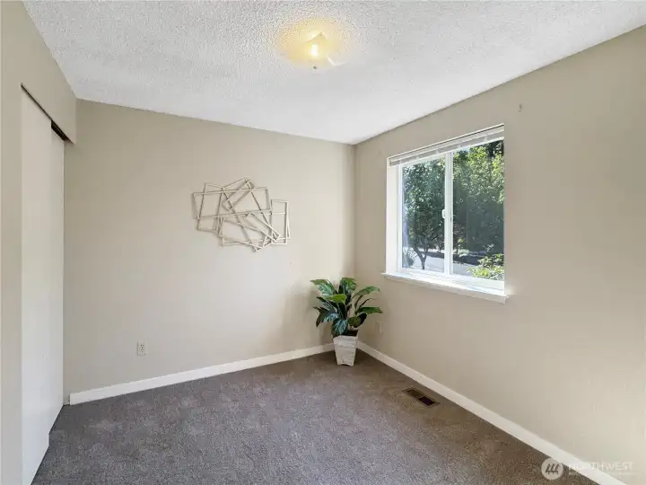 Additional main floor guest bedroom.