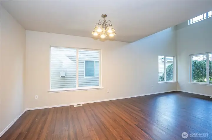 The dining area flows seamlessly from the living space, creating an open and connected layout.