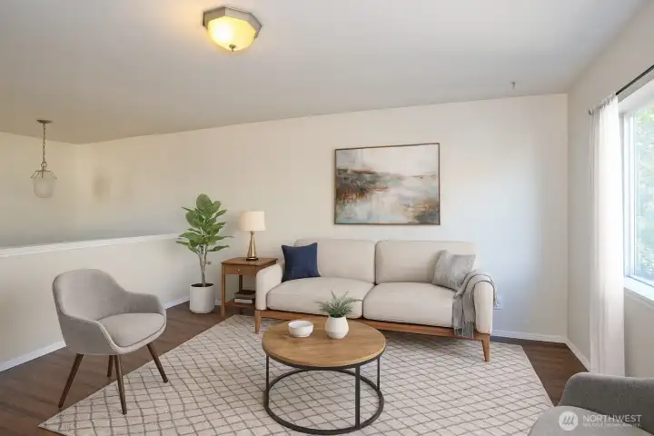 Open loft area, ideal for work, play, or relaxation - Virtually staged to inspire your vision of the space.