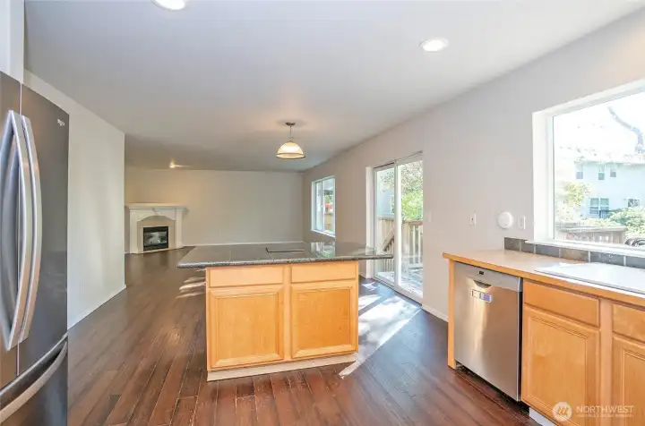 The family room flows seamlessly from the kitchen, and with so much natural light, you might need your sunglasses indoors!