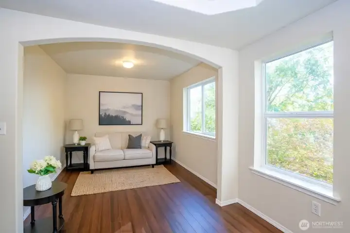 Primary suite features a cozy sitting area — perfect for relaxing or unwinding after a long day - Virtually staged to inspire your vision of the space.