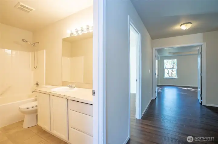 Full guest bathroom located on the upper level.