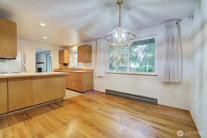 The dining room window looks out to the private backyard.
