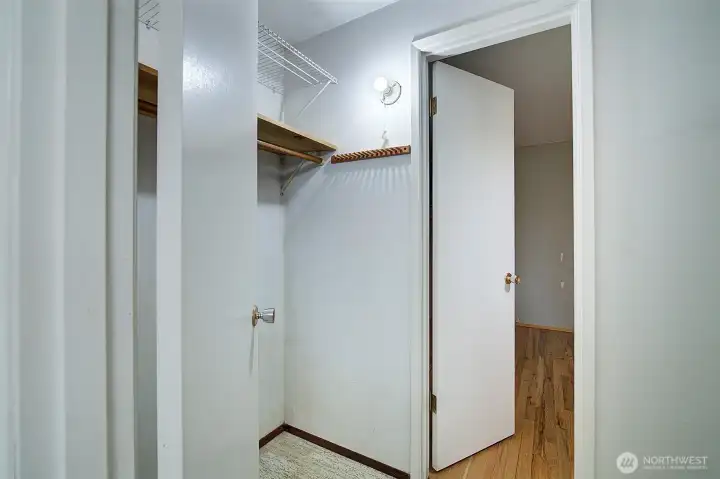 The walk-in closet is between the primary bedroom and main bathroom. Potential private bathroom addition for the primary bedroom?