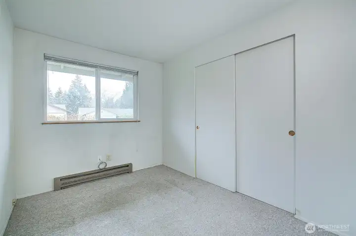 Bedroom #3 looks out to the front yard.