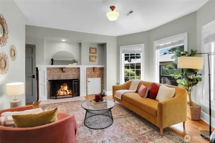 ersatile main-level ensuite offers flexibility to use as a traditional bedroom or a cozy second living space, perfect for guests, a home office, or everyday comfort.