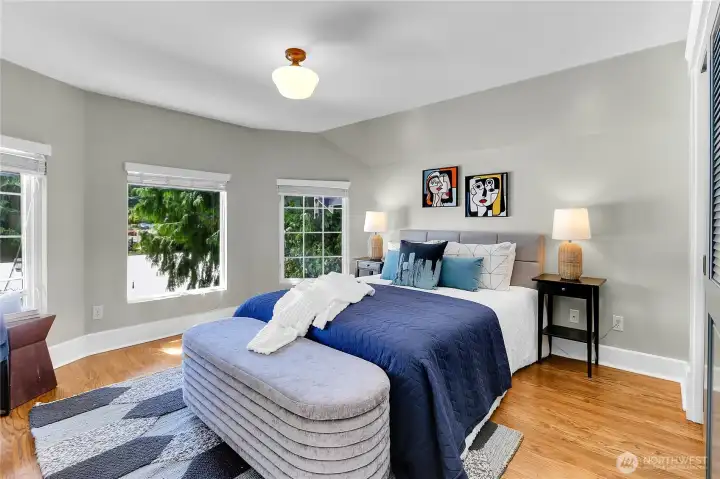 Large upper-floor guest bedroom offering comfortable space and added privacy.