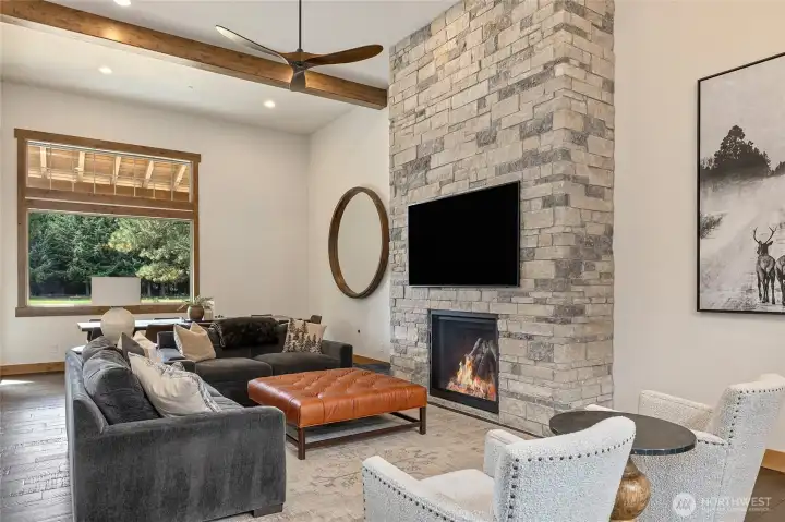 Stone floor to ceiling fireplace