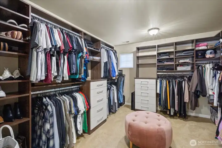 Huge walkin w/California custom shelving.