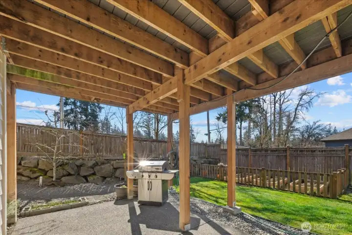 Patio with covered BBQ space.