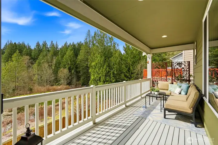 Coffee out here or winding down after a long day is not a problem out on the upper level covered patio, just check out all of the gorgeous trees