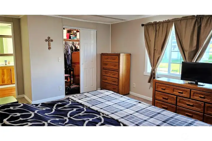 Primary Bedroom with walk-in-closet & attached bath
