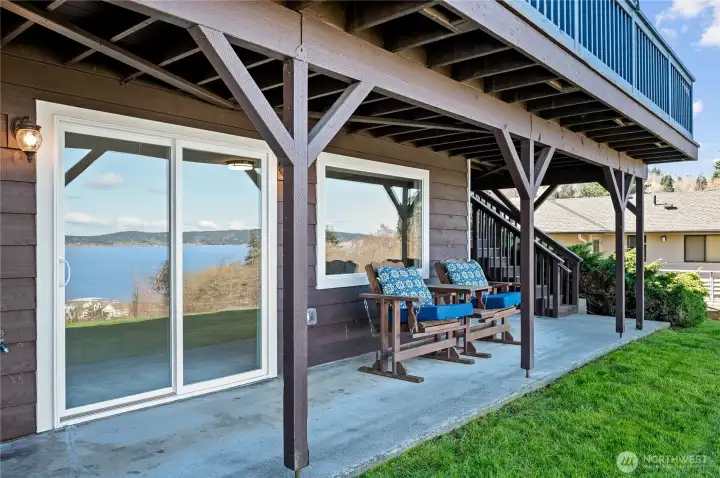 Lower level patio with views and direct access to bonus family room.