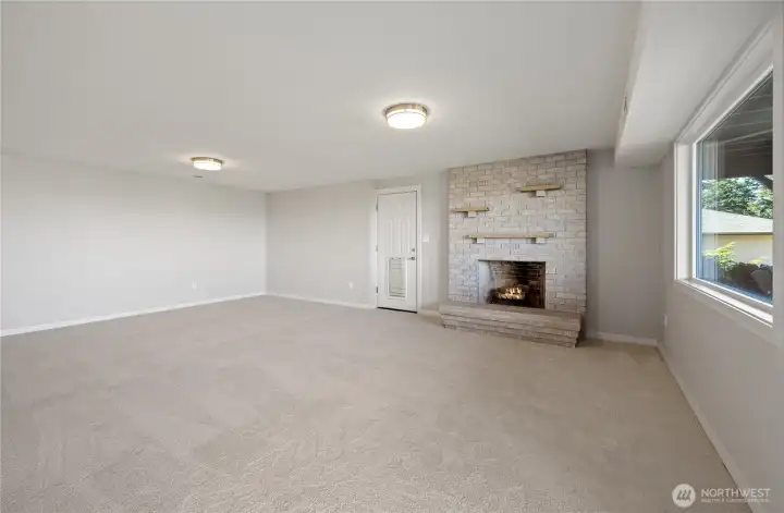 Bonus family room with wood burning fireplace.