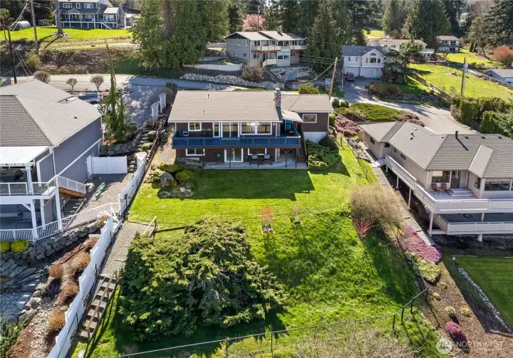 Spacious yard with fencing.