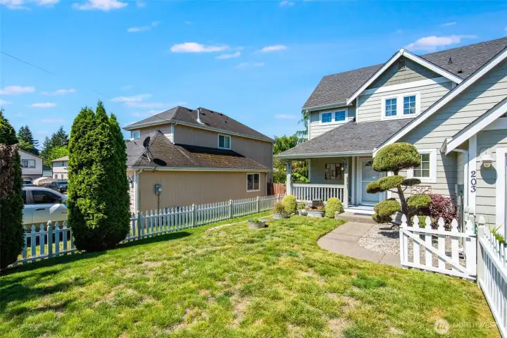 Front fully fenced Yard.