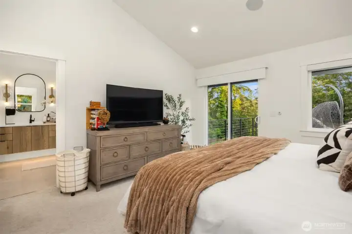 Primary bedroom with spa like ensuite bathroom