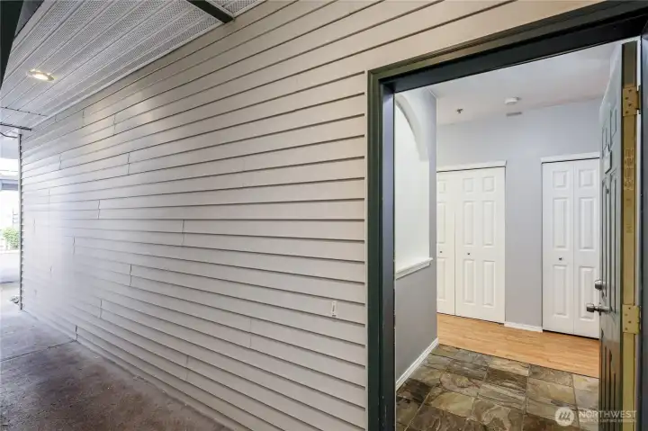 Stone flooring at foyer with architectural detailing.