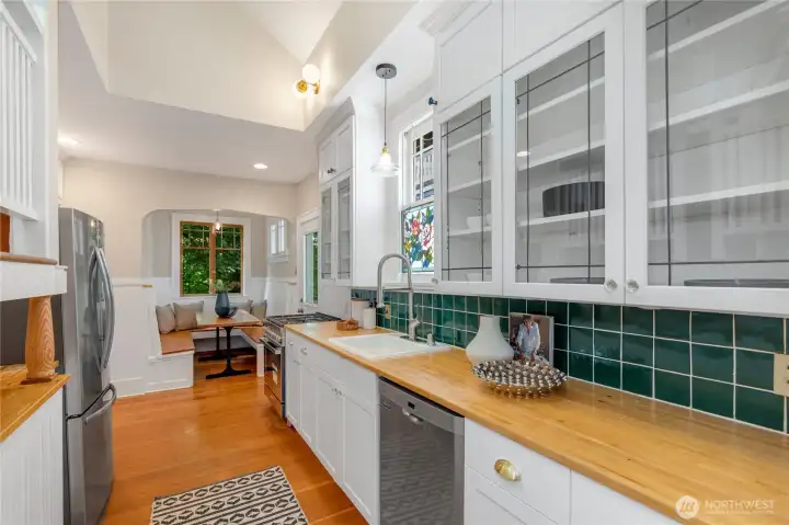 Kitchen with newer appliances, charm and direct access to backyard