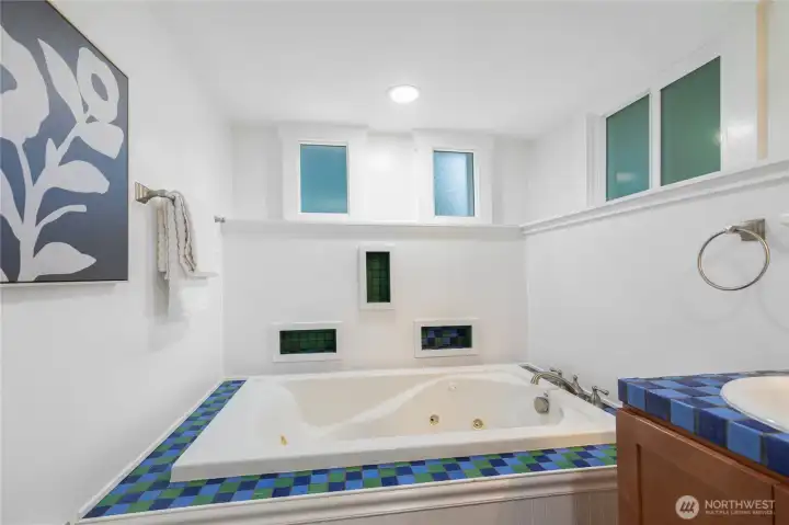 Basement full bathroom with soaking tub