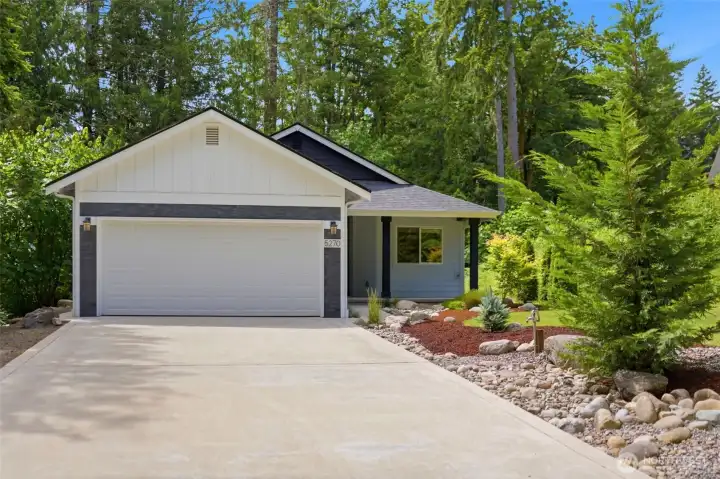 Welcome home. A long, private driveway pulls you away from the hustle and bustle into your own quiet, manicured retreat.