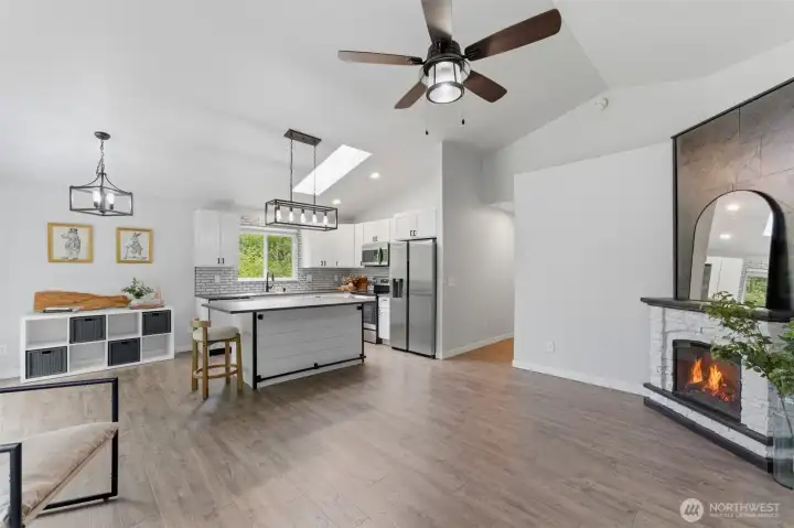 Flawless flow from front to back. This great room layout makes the 1,214 square feet feel incredibly spacious, bright, and cohesive.