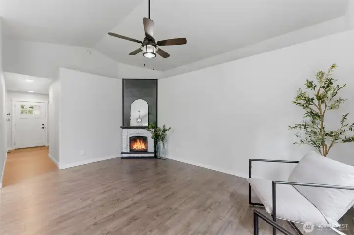 The perfect spot to unwind. This elegant fireplace elevates the living space, making it the ultimate cozy retreat after a long day.