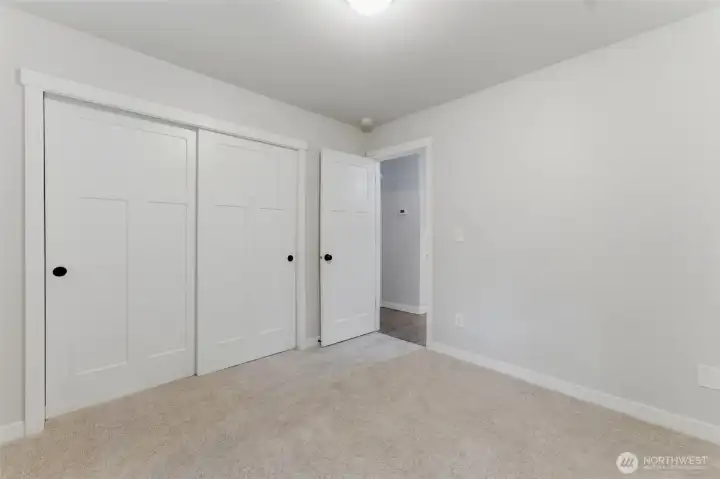 Practical and spacious. These wide closets ensure that guests or family members have plenty of room for storage, keeping the bedroom clutter-free.