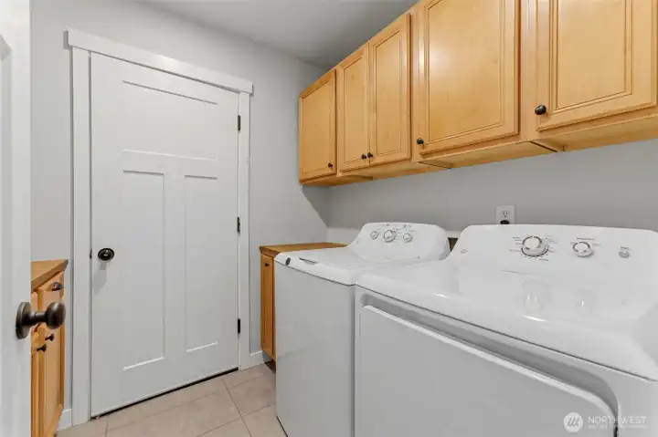 Smart use of space! Situated right off the main living areas, the laundry setup offers a practical layout that makes chores a breeze.