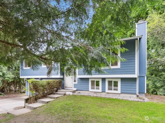 Situated on a generous tree-lined lot with numerous upgrades.