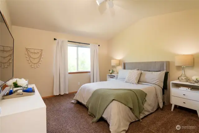 Welcome to the Primary bedroom, a sanctuary of it's own. Spacious enough for this Kind Sized bed and a full compliment of furniture! The Private EnSuite and walk-in closet are sure to please!