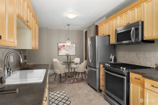 There is plenty of cabinet storage and counter space in the kitchen.