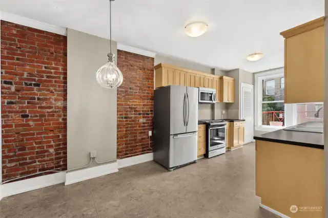 The dining and kitchen area without furniture.