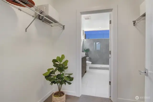 Primary bedroom walk-in closet.