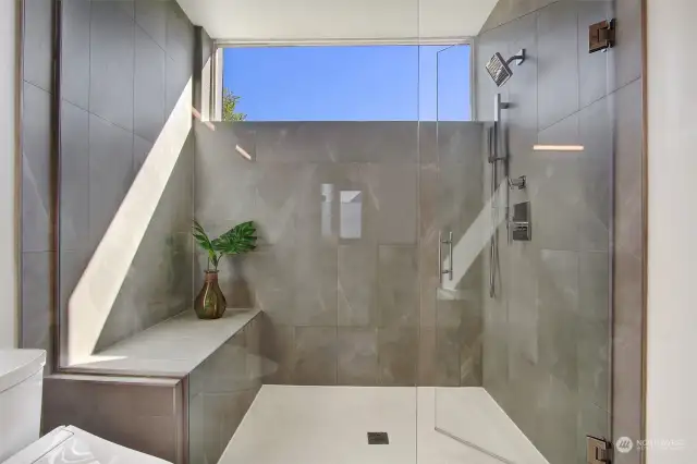 Primary bath with walk-in, tile shower.